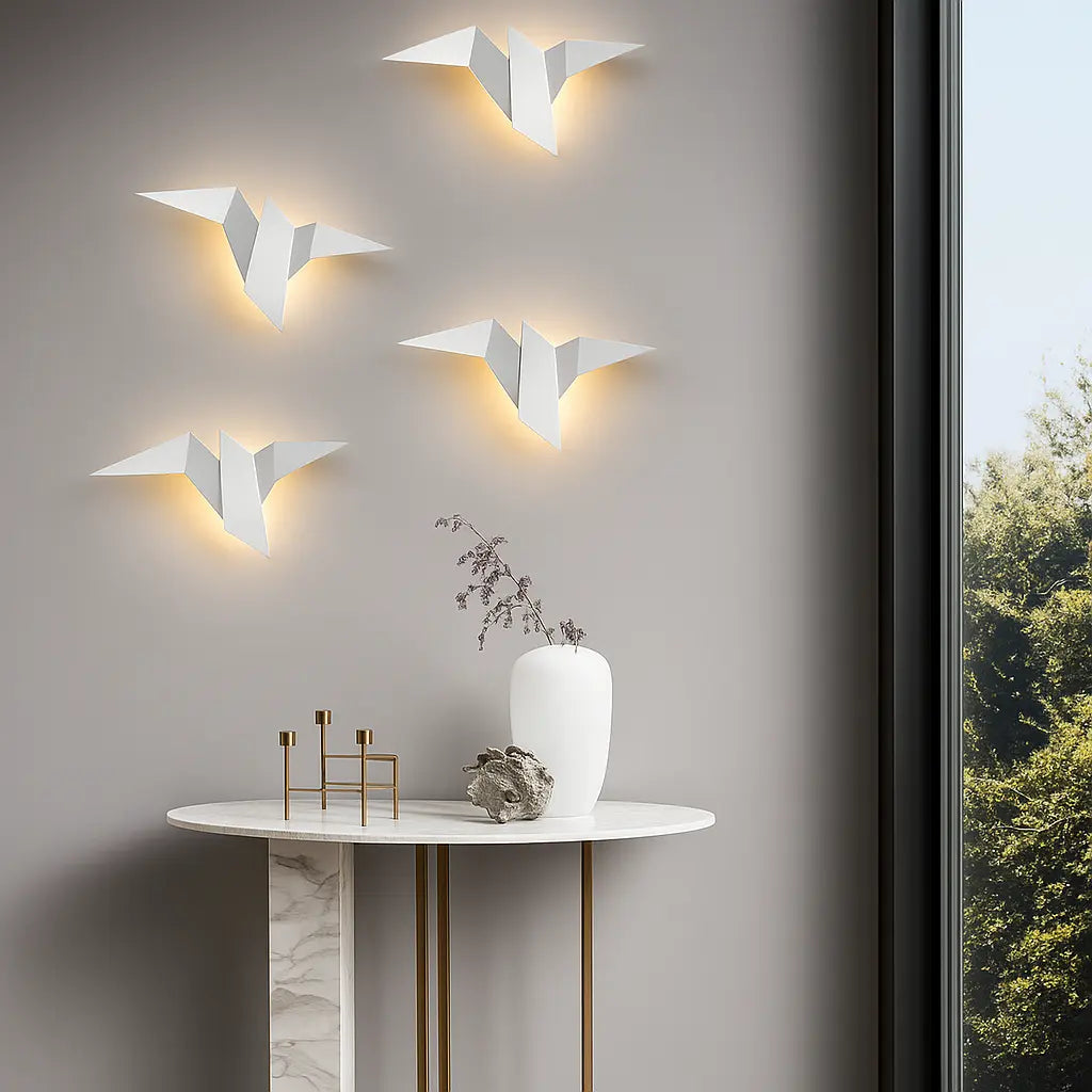 Warm, sculptural LED wall lights emit soft, diffused illumination for an inviting ambiance.