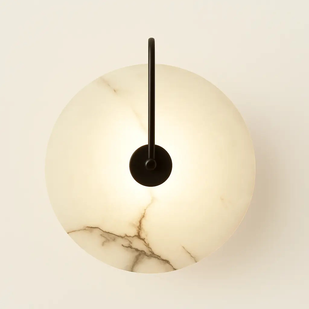 Elegant circular lamp delivers soft, glowing marble-patterned light with sophisticated gold accents.