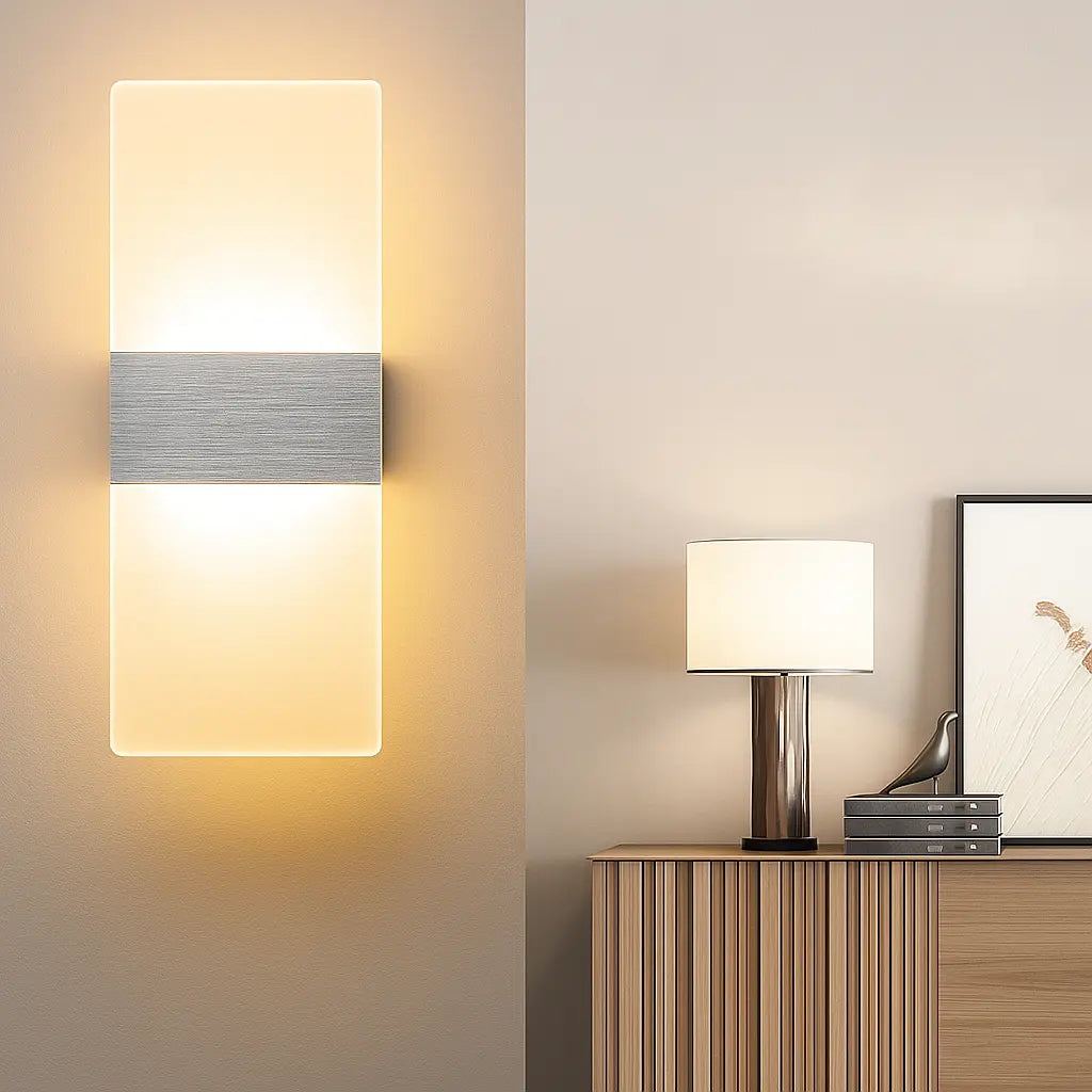 The ORLUNE HOME Gold LED Wall Sconce pairs beautifully with a sleek metallic table lamp.