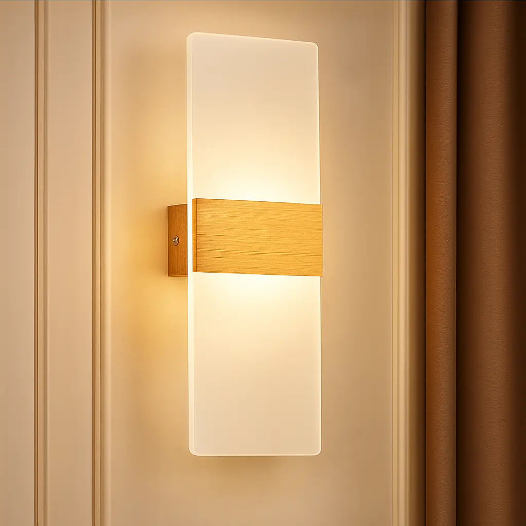 Warm LED sconce emits a soft, inviting glow for the perfect cozy ambiance.