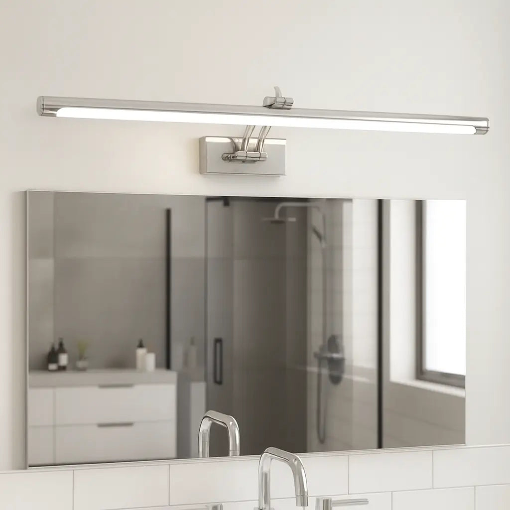 ORLUNE HOME LED sconce bathes the mirror in elegant, modern bathroom lighting.