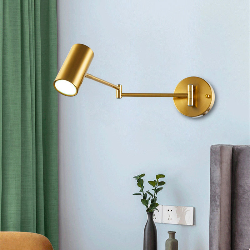 ORLUNE HOME Gold Aluminum Wall Light casts a warm glow with its adjustable arm.